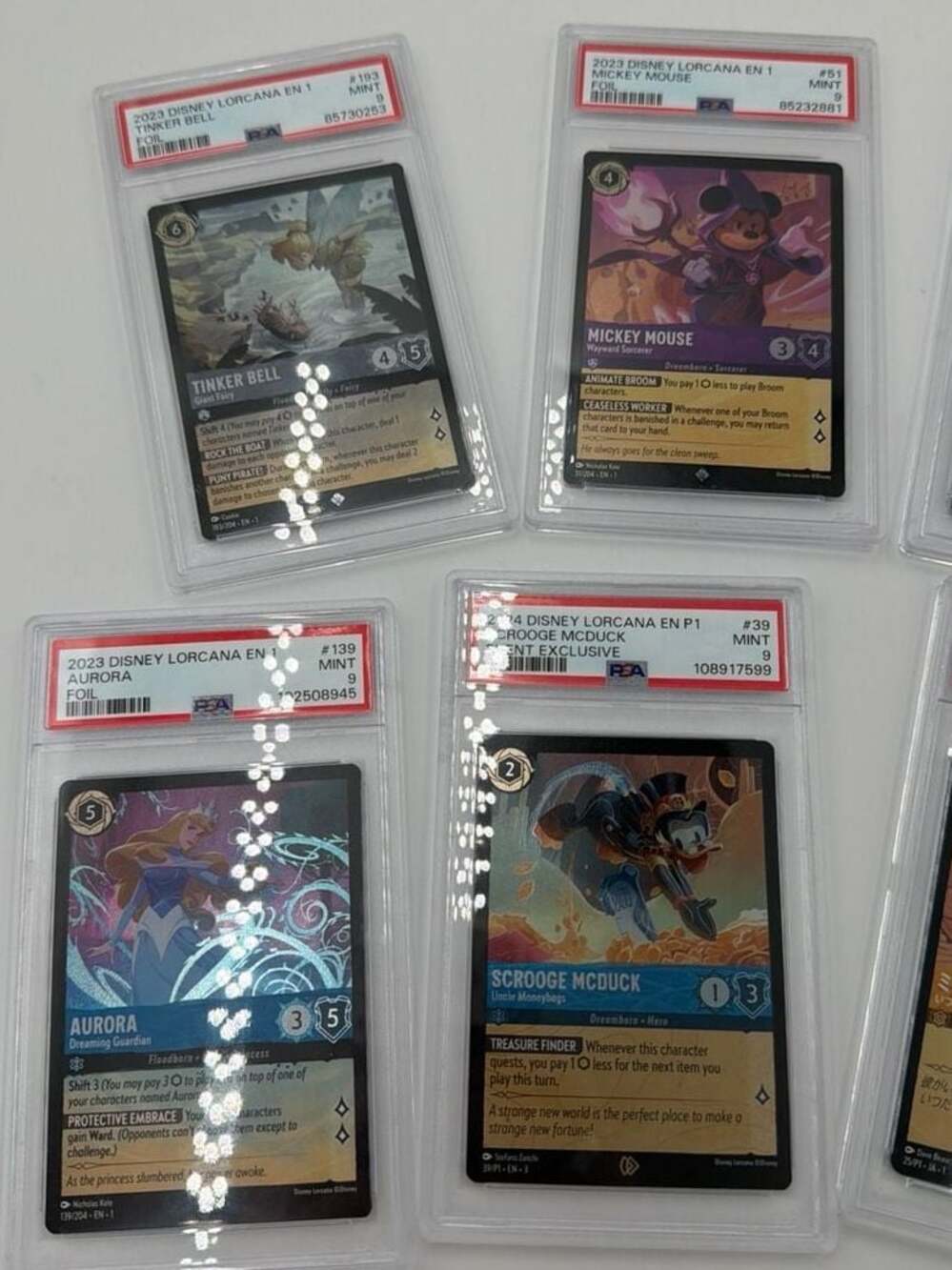 Lot of 8 PSA 9 Mint Disney Lorcana Graded Cards - Picture 2 of 6